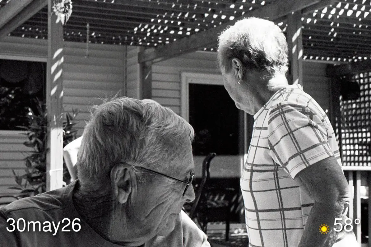 Black and white film photo of my mom and dad